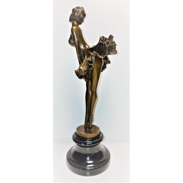 A very beautiful and excellent ladies bronze with very beautiful revealing design from the early 20th century, which shows...