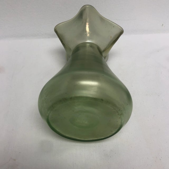 Antique circa 1900 ruffled top iridescent green Loetz art glass vase.