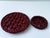 Charming pair of mid-century Vallauris, France ceramic trivets in a rich burgundy/oxblood glaze, featuring an intricate...