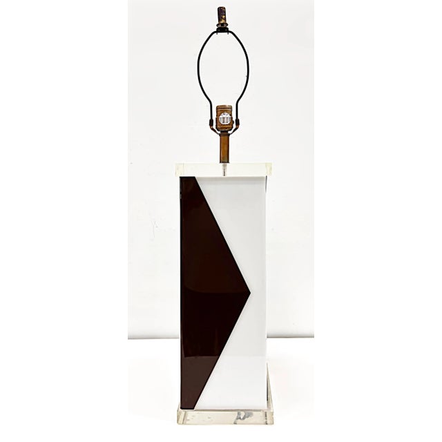 1970s Over-scale Geometric Lucite and Acrylic Lamp Offered for sale is an over-scale 1970s Lucite and two-tone acrylic...