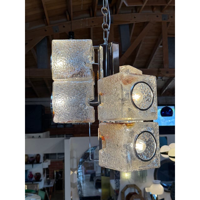 An exceptional Italian Mid-Century Modern pendant chandelier designed by Toni Zuccheri for VeArt, dating to the 1970s....