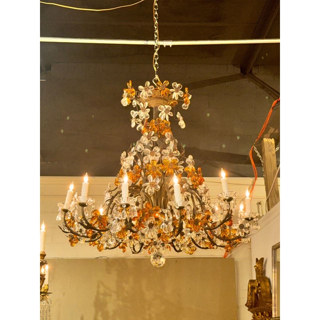 The French Crystal and Amber Flower Chandelier is beautiful fixture that exudes elegance and charm. So unique with clear...
