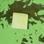 This artwork features a central, softly illuminated square set against a lively backdrop of vibrant greens and darker...