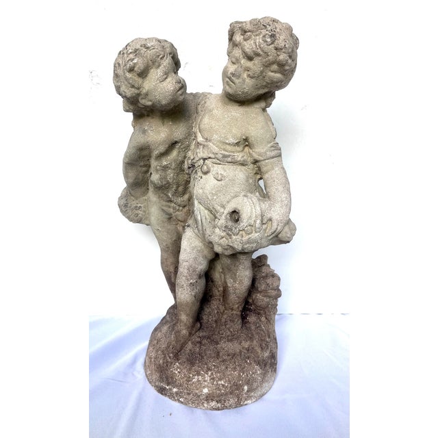 Captivating mid-20th-century Neoclassical garden sculpture. Masterfully cast in solid concrete (reconstituted stone). This...