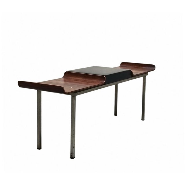 A bench, which can also be used as a low table, an iconic piece of Italian design, designed in 1958 by architects Franco...