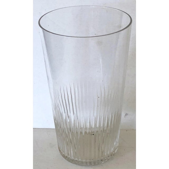 These delicate glasses are fashioned with fine ridges radiating from the bottom. Purchased at a Swedish estate along with...