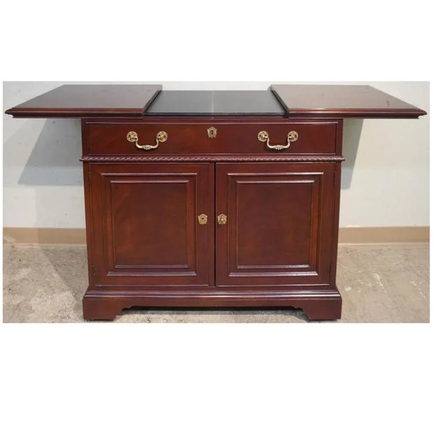 A 20th Century Drexel Mahogany Slide Top Rolling Dry Bar Buffet Server in great vintage condition edition. Features two...