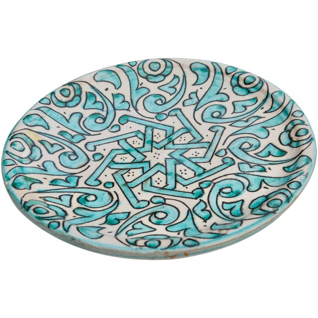 This gorgeous antique ceramic plate is a natural when it comes to bouncing light around and creating the illusion of a...