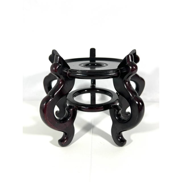 Elegant vintage Chinese glossy dark brown solid rosewood display stand or pedestal. Circular stand with five slim stylised...