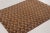 A vintage Turkish hand-knotted wool rug from the 1950s–1960s featuring an elegant allover floral pattern in warm walnut,...