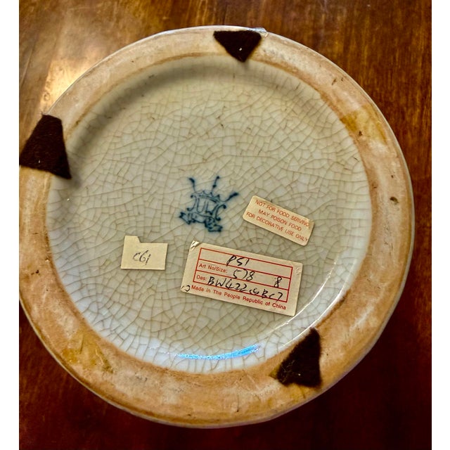 This is a high-quality decorative porcelain piece that blends traditional Chinese craftsmanship with European decorative...