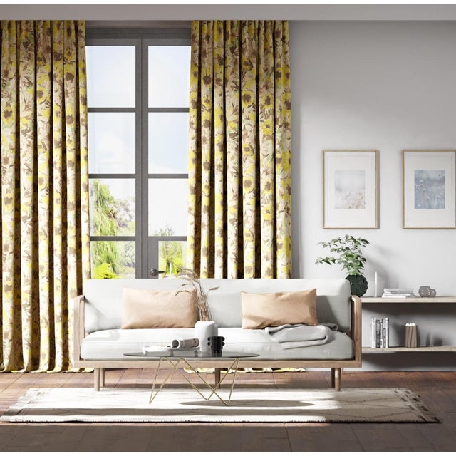 Turning their heads towards glamorous interiors impressionist sunflowers adorn this free-spirited print. Hand drawn in the...