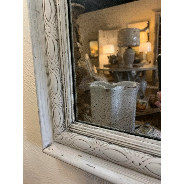 Antique mirror placed in a grey antique frame. Great for a entry or powder room. From France.