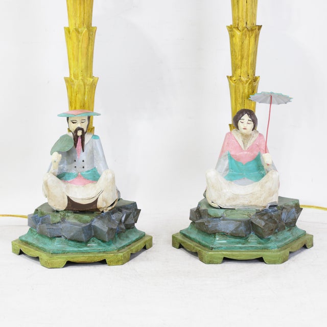 This striking pair of vintage-style tole table lamps showcases a vibrant and colorful expression of classic Chinoiserie...