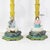 This striking pair of vintage-style tole table lamps showcases a vibrant and colorful expression of classic Chinoiserie...