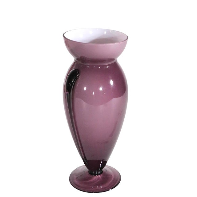 Mid Century art glass vase having an elegant teardrop form body of cased purple and white glass, with applied purple glass...