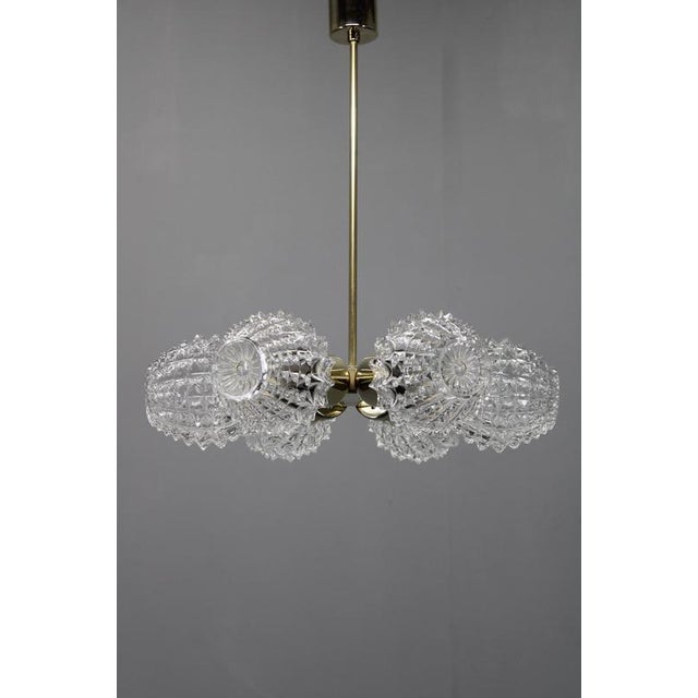 Exceptional mid century Sputnik chandelier from 1970s Czechoslovakia, crafted in the famous glassmaking region of...