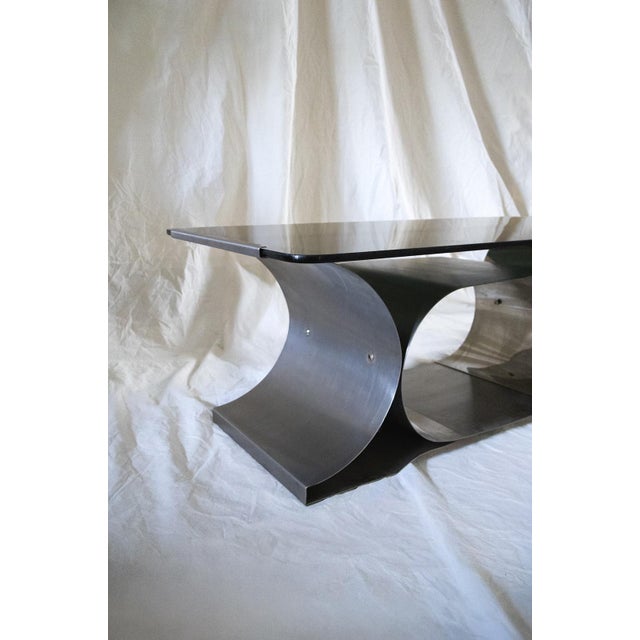 Coffee table designed by Franco Costalonga for Mimo Leone & Co. in the 1970s. Steel structure composed of curved elements...