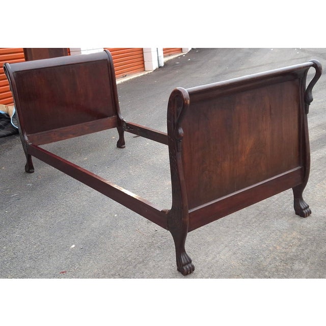 19th Century American Empire Carved Swan Mahogany Sleigh Daybed Circa First Quarter 19th Century, featuring four Carved...