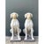 This charming pair of vintage cement dog sculptures captures the poised elegance and calm alertness of seated canines,...
