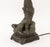 Art Deco Figural Metal Amber Glass Globe Shade Table Lamp. 21.75" H x 5.75" W x 6" D. Provenance: From a New York City...