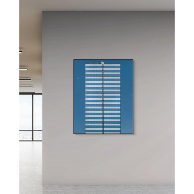 Exclusively available in the U.S. through ART AT HOME, Two Moons by Marc Fischer presents a restrained architectural study...