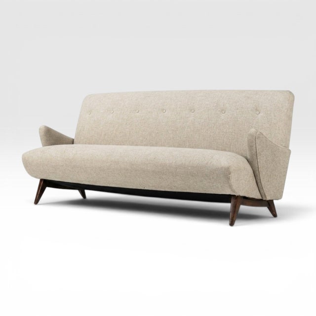 Rare early example from the renowned Jens Risom — this Model 37 sofa dates to the 1940s and exemplifies the designer's...