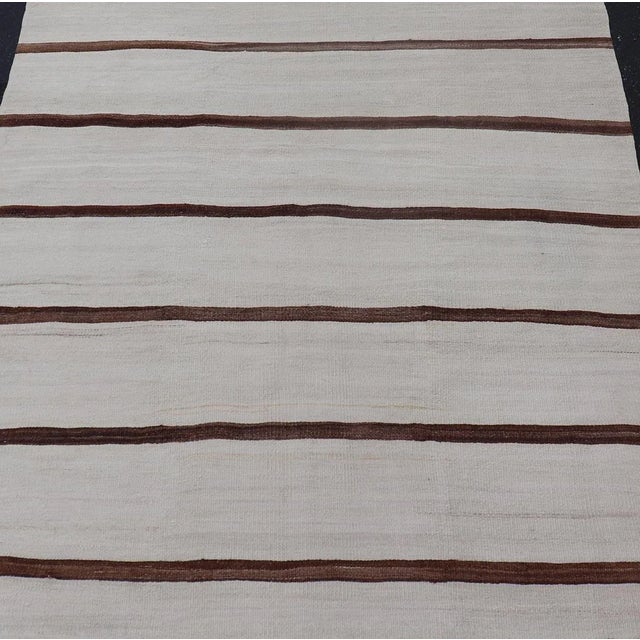 Turkish Vintage Kilim in Shades of Brown and Ivory with Stripe Design. Keivan Woven Arts / rug EN-15170, country of origin...
