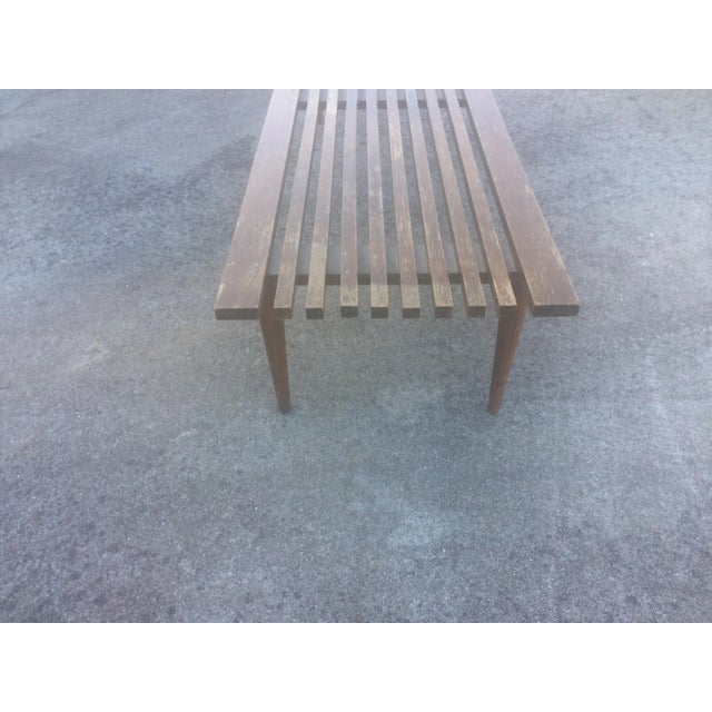This modern piece is the perfect choice to add to your living space as a coffee table or as a bench for occasional...