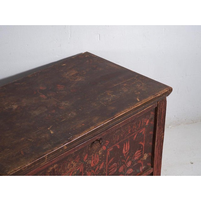 Dowry chest in pine wood, hand-polychromed with floral motifs and dated 1891. A Central European piece of folk...