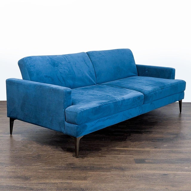 This stylish West Elm 3-seat sofa features a rich blue fabric and sleek metal legs. Easily converts into a flat bed,...