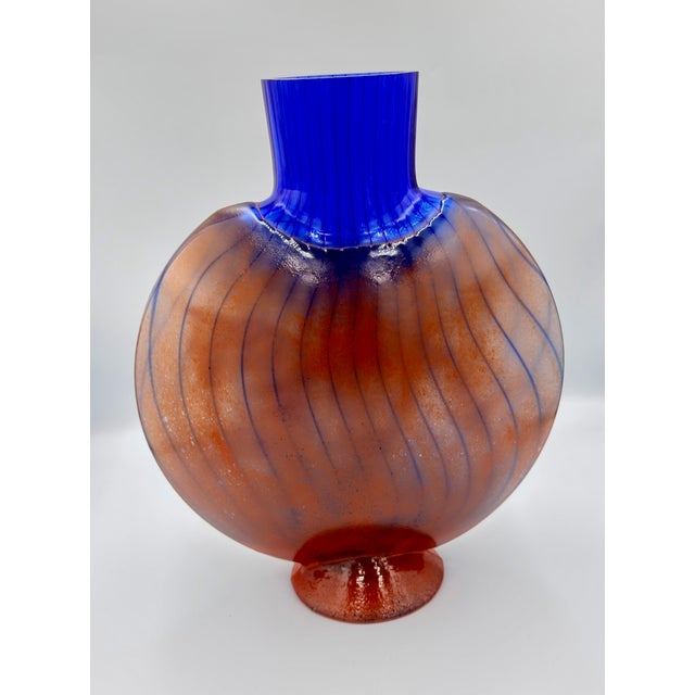 This striking art glass vase by Kjell Engman is part of the coveted Bon Bon series, designed in 1989 for Kosta Boda,...