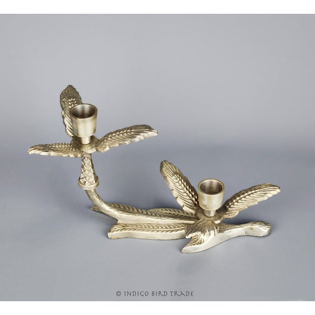 Vintage Silver Metal Floral Candelabra This lovely candelabra is made from metal and features beautiful floral design. It...