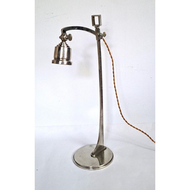 This extravagant table lamp dates from the late Art Nouveau period. This superb design is inspired by Josef Hoffmann's...