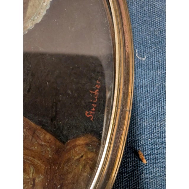 This vintage nineteenth century oval work of art depicts an elegant Elizabethan woman in a slated position dress with...