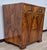 This cabinet, entirely made of blond walnut burl, originally designed as a record rack, features an exclusive design. The...