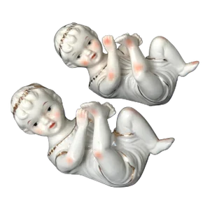 Antique Bisque Porcelain Piano Babies With Gold Trim-a Pair