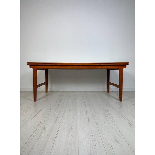 Minimalistic xl vintage dining table original from the 1960s. Functional design with two extendable plates. They can be...
