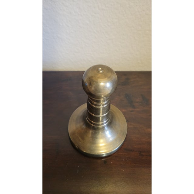 A rare find from Neiman Marcus, this vintage brass meat pounder transforms a utilitarian kitchen tool into a statement of...