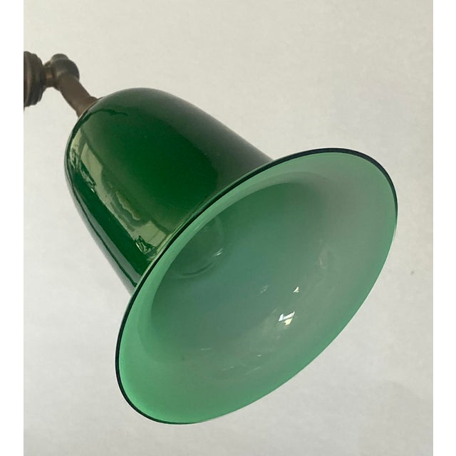 The device on the nickel-plated shaft easily slides up and down, so you can position the shade anywhere you like. White...