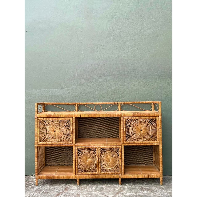 This stunning vintage sideboard is a masterful display of 1970s coastal craftsmanship, featuring intricate starburst or...
