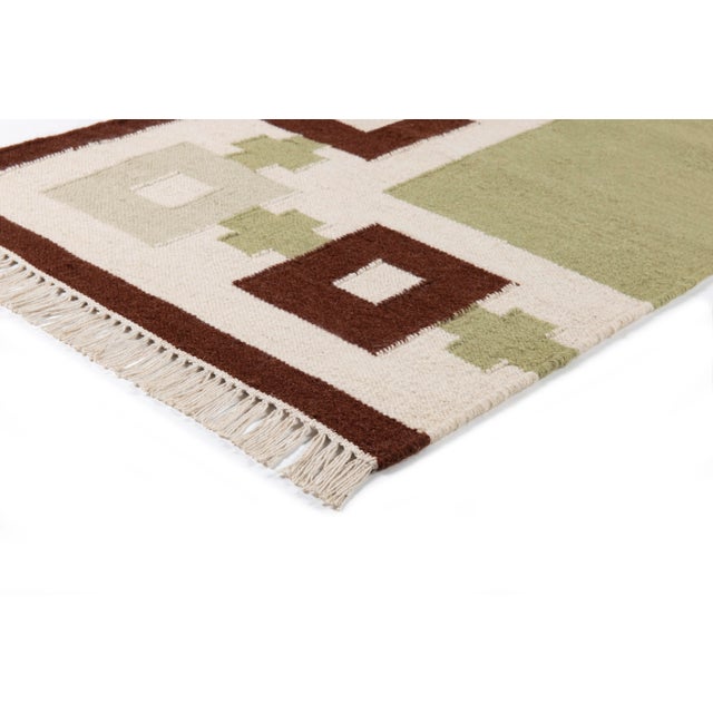 The versatile Chain Rug was inspired by vintage enamel jewelry and designed with a Scandinavian sensibility. Thoughtful...