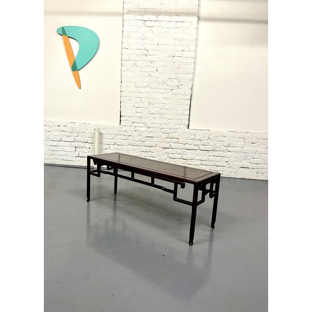 Late 2oth century solid carved rosewood coffee table. This is a quality hand carved table; no joinery. these usually...