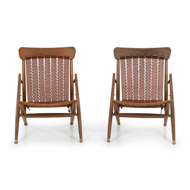 Maruni Mokko of Japan folding sling chairs, Quarter sawn oak frame with original brown nylon mesh. Original very good...