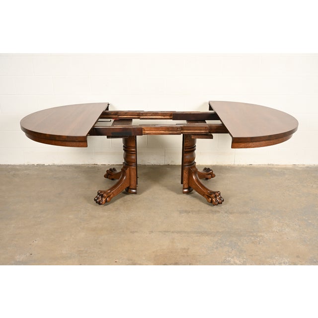R. J. Horner Style Antique Victorian Carved Oak Split Pedestal Extension Dining Table With Lion Paw Feet | Newly Refinished For Sale In South Bend - Image 6 of 14
