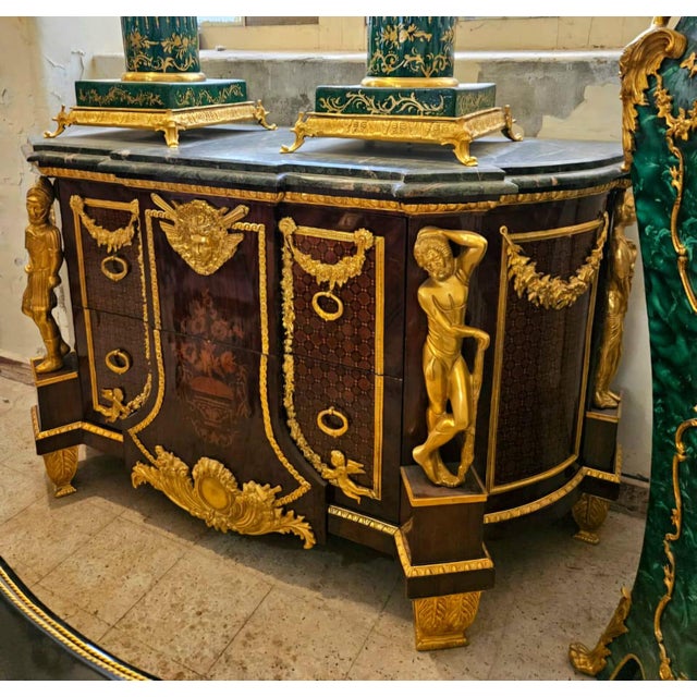 An extraordinary Empire-style sideboard cabinet that commands attention with its monumental scale, luxurious materials,...