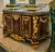 An extraordinary Empire-style sideboard cabinet that commands attention with its monumental scale, luxurious materials,...