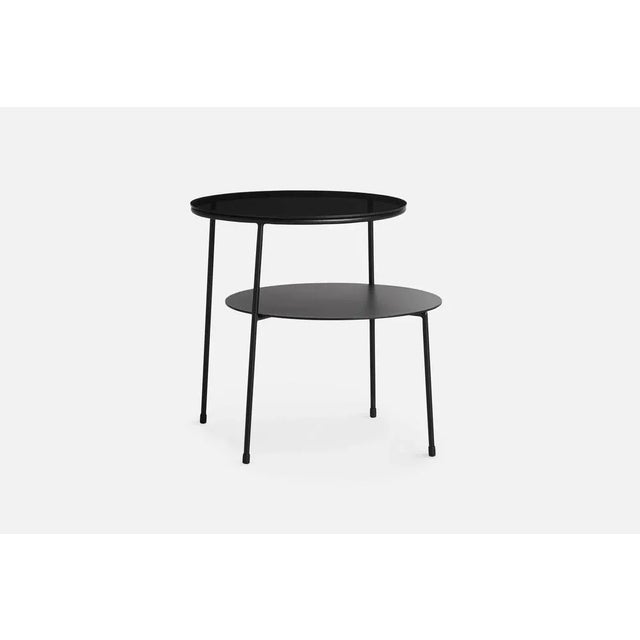 Duo side table by chifen cheng materials: metal, glass dimensions: d 51 x w 60 x h 51 cm the founders, mia and torben...