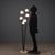 Vintage floor lamp of Italian manufacture and produced in the 1960s with marble base, black enamelled metal stems with...