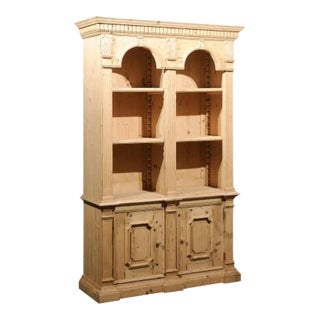 Italian Neoclassical Style Carved Pine Bookcase with Arched Motifs and Capitals For Sale